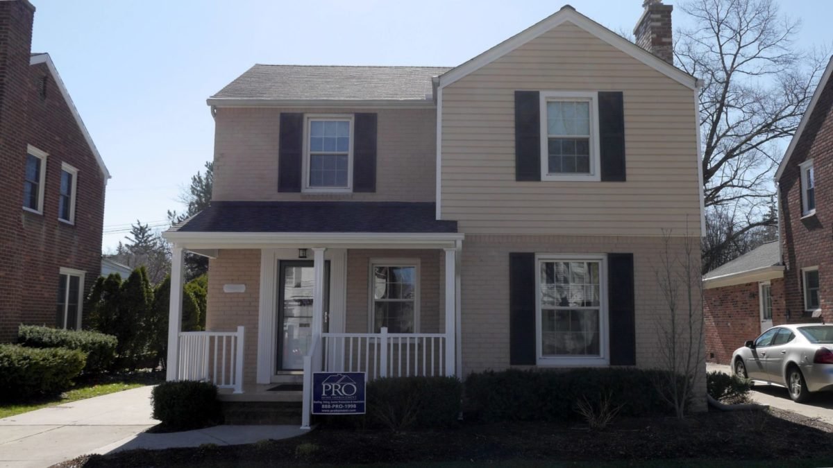 Mary Lou's Grosse Pointe home with new roofing, siding, insulation and gutters