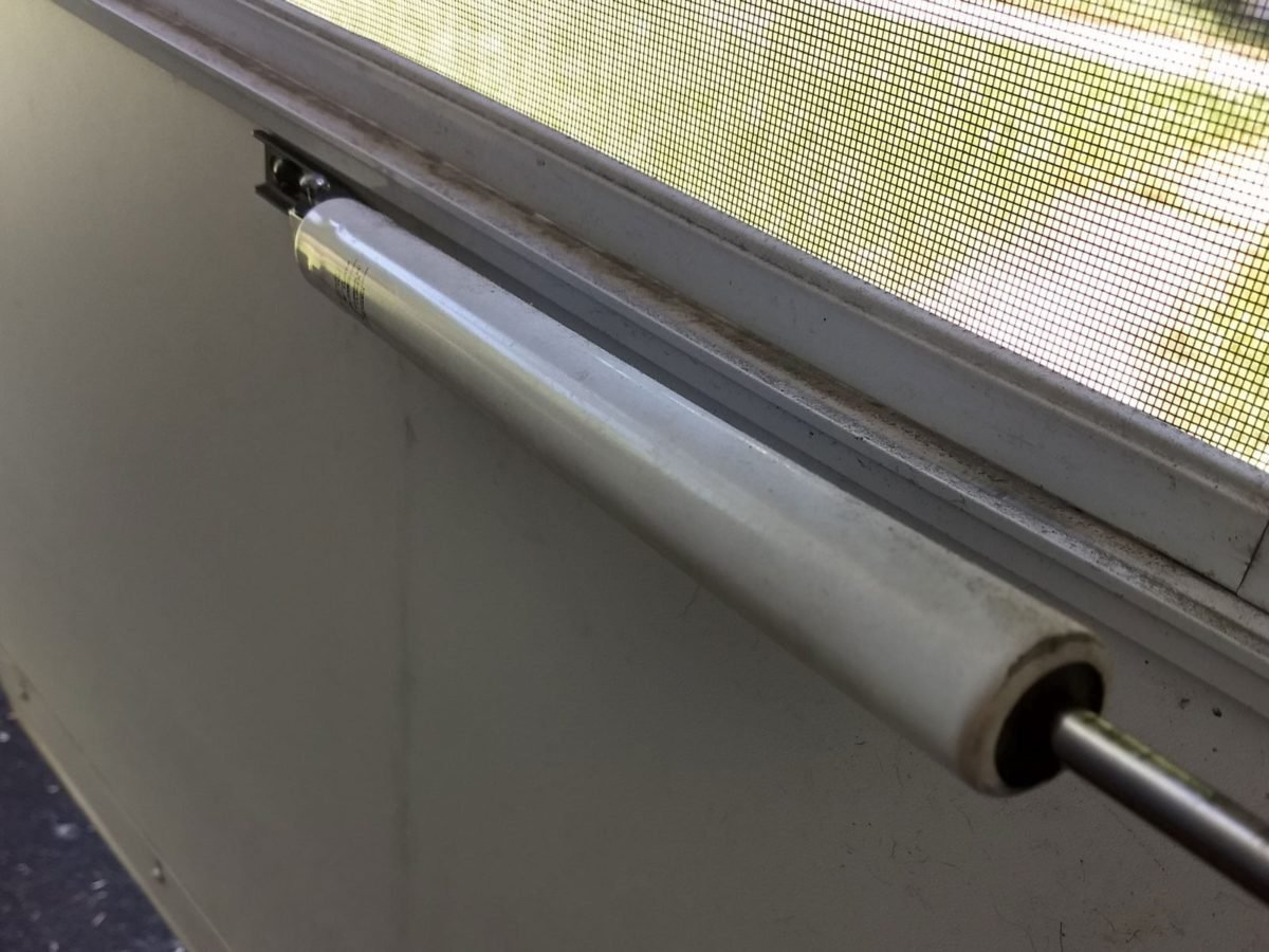 Storm door closer