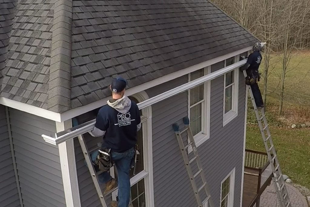 Replacement seamless gutter system installation