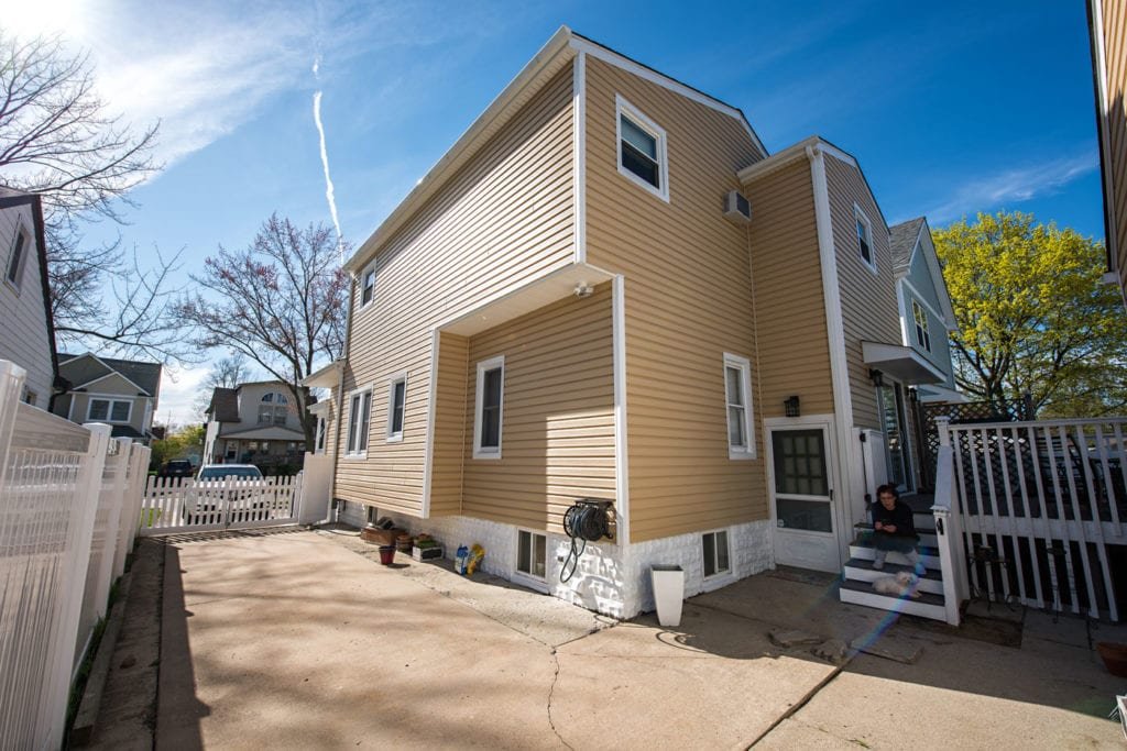 Berkley Roofing, Siding, Gutters, Insulation, Windows Back Left After Install