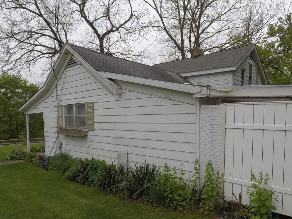 Pickney Gutters and Siding Side Before Install