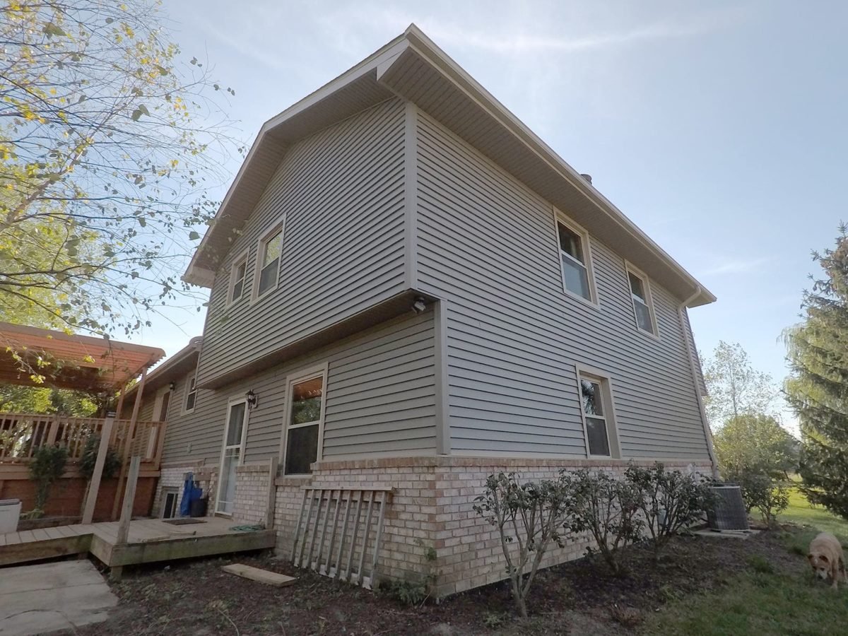 Monroe windows, siding, roofing, and gutters back right after install