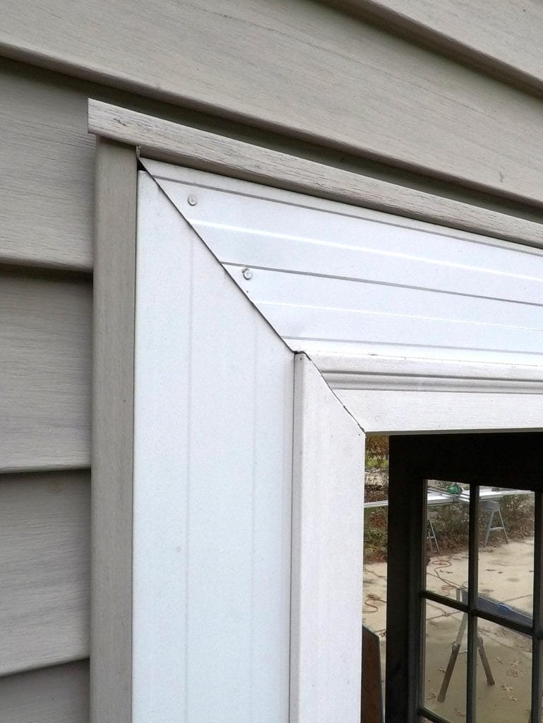 Metamora Siding and Gutters Door Frame Before Install