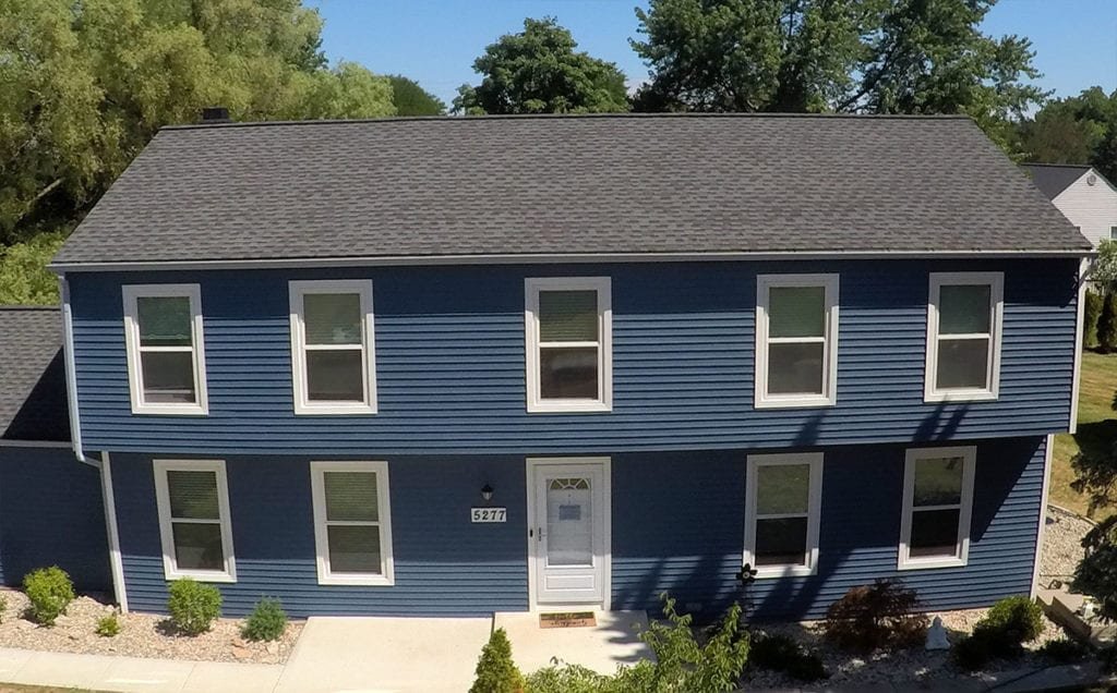 West Bloomfield Siding, Windows, and Gutters Drone Front After Install