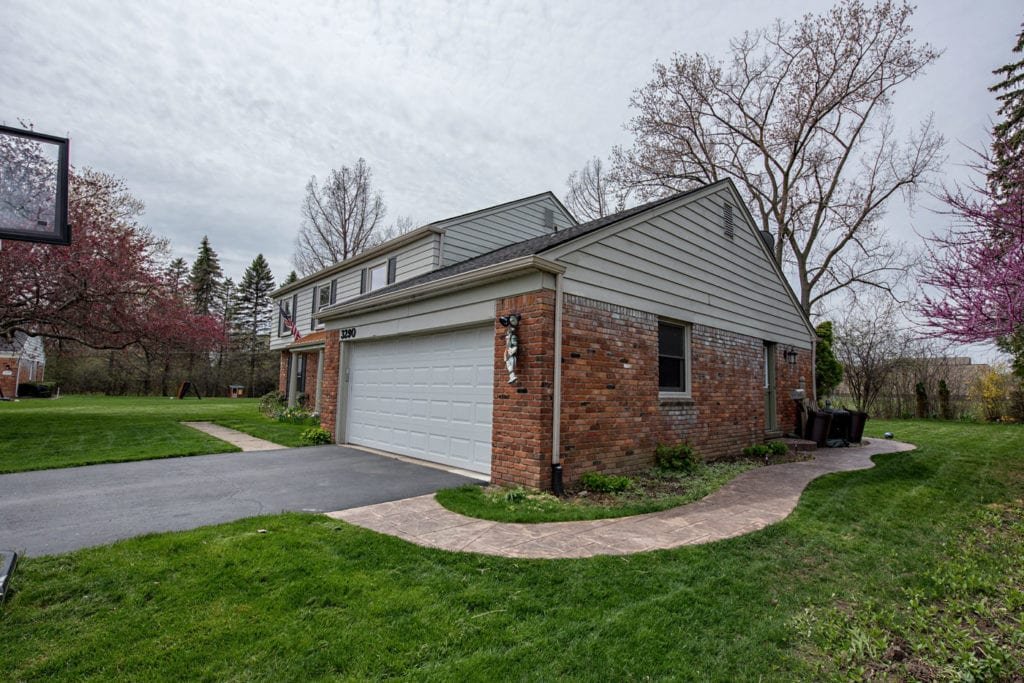 Bloomfield Hills Roofing, Siding, Gutters, Insulation, and Windows Front Right Before Install