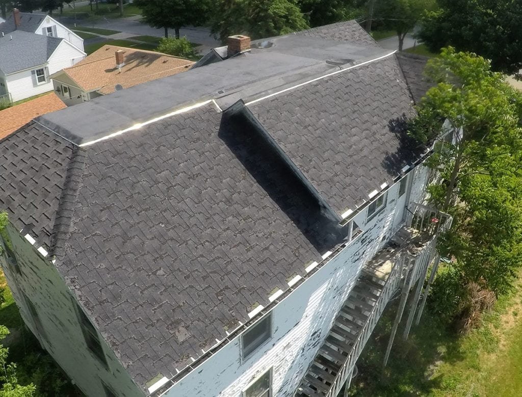 Adrian Roofing, Siding, and Gutters Back Left Roof Before Install
