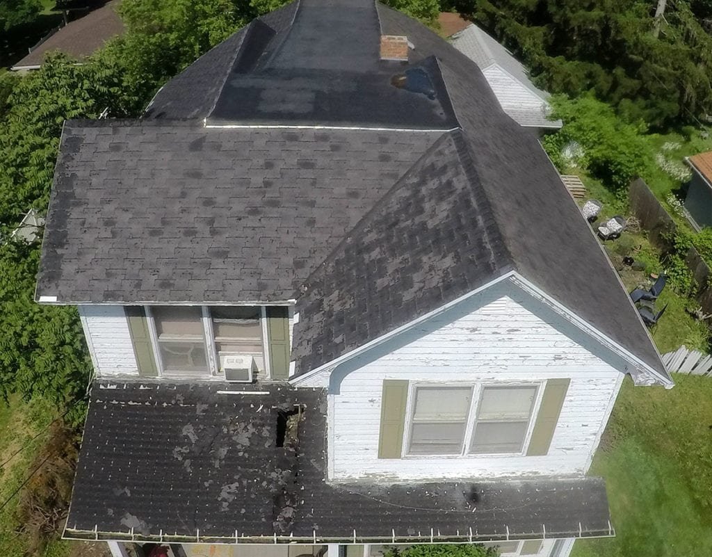 Adrian Roofing, Siding, and Gutters Front Roof Before Install
