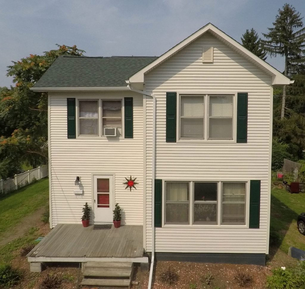 Adrian Roofing, Siding, and Gutters Front After Install