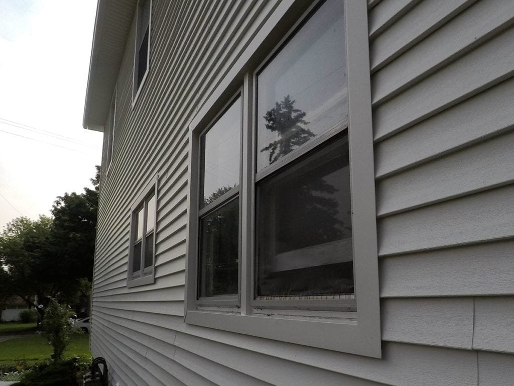 Adrian Roofing, Siding, and Gutters Window Frames After Install