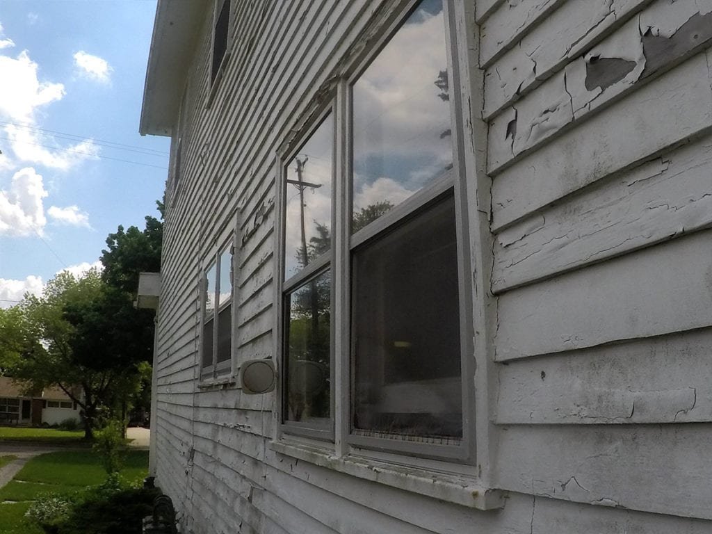 Adrian Roofing, Siding, and Gutters Window Frames Before Install