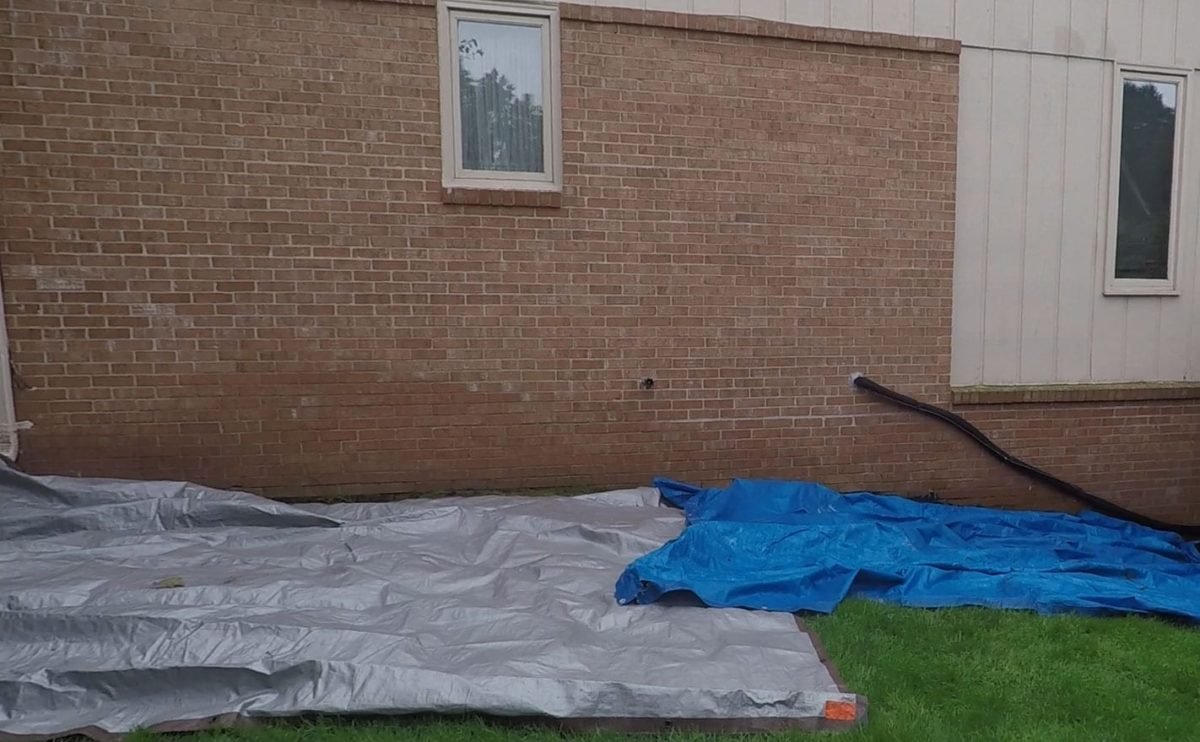 Laying out tarps