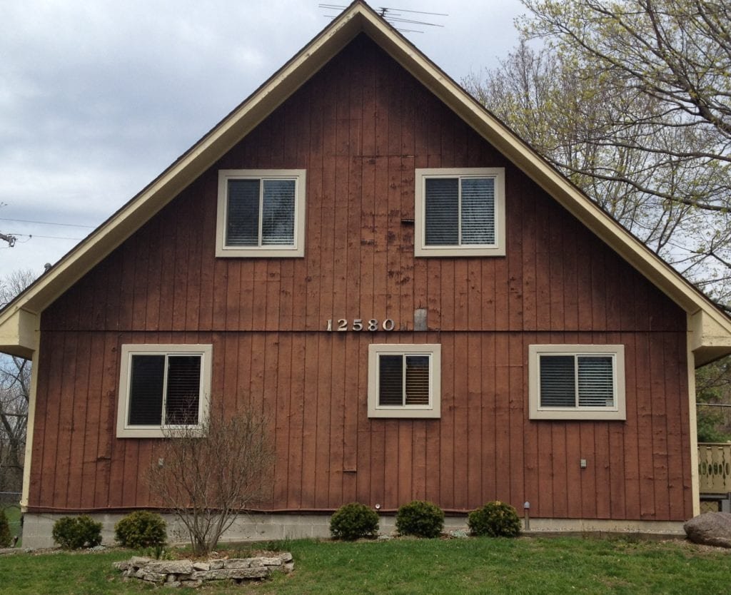 Vertical Vinyl Siding Replacement Before
