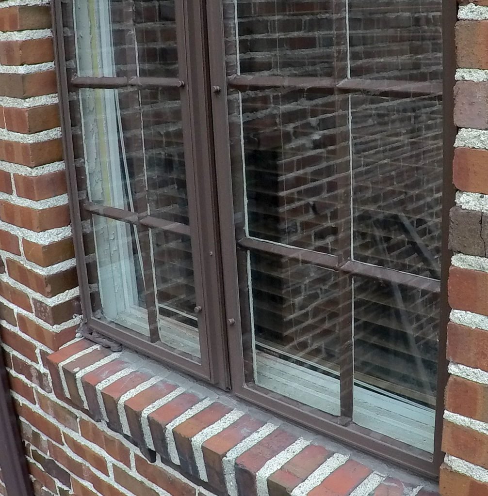 Pontiac Window Replacement - Back Living Room Before